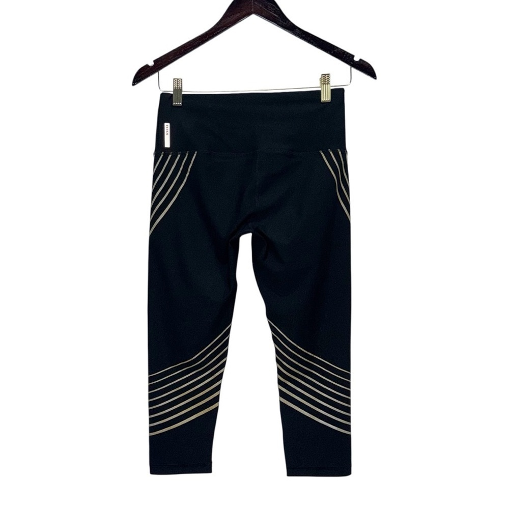 RBX Capri Women’s Size Small P Leggings in Black with Gold Stripes